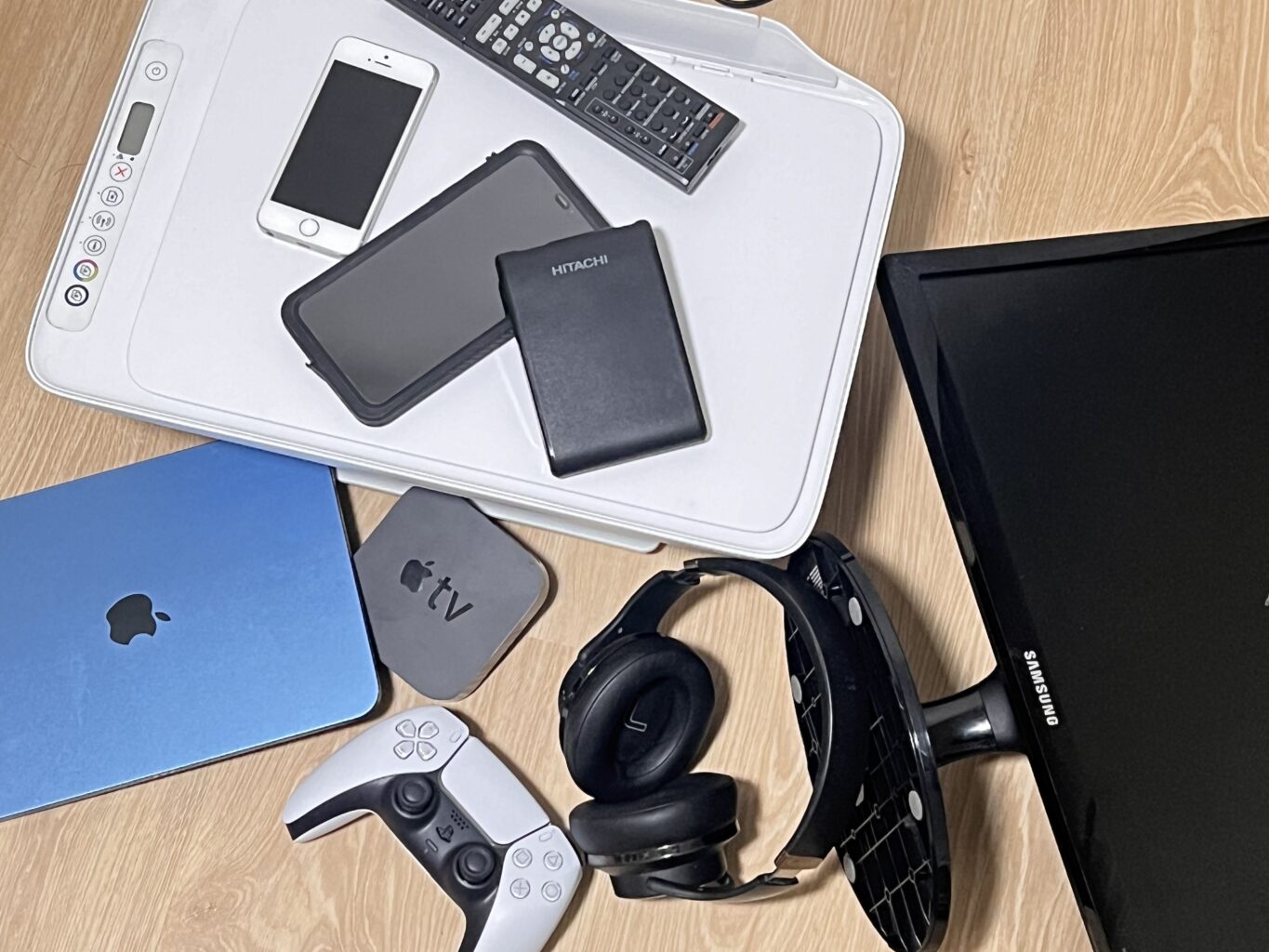 A pile of old electronics, ready for recycling.